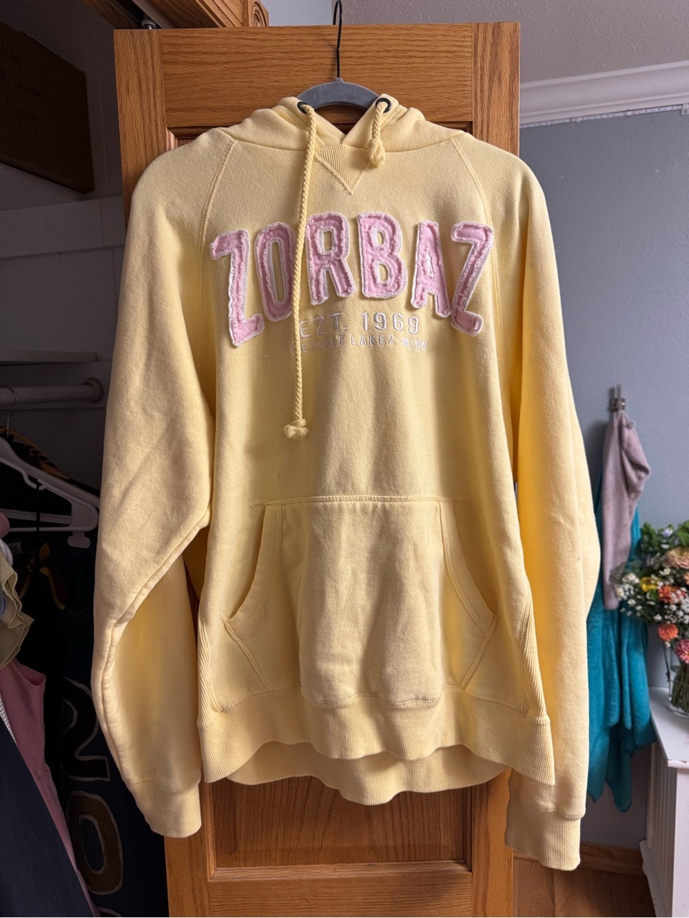 Yellow Pullover Hoodie with Pink Applique